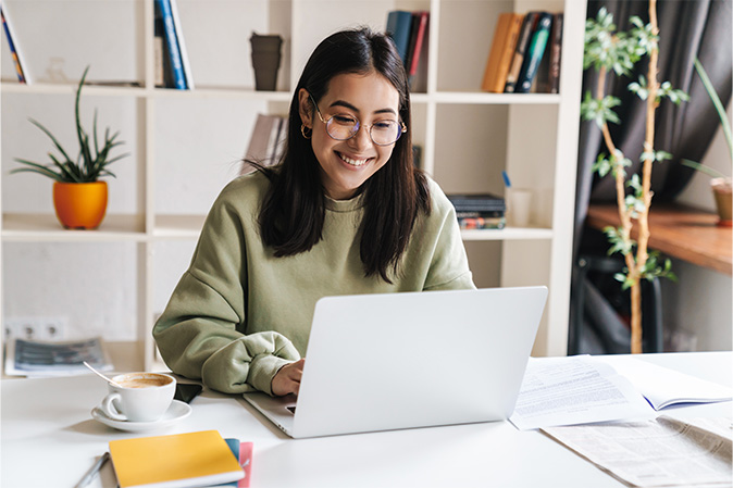 young woman in online call via laptop